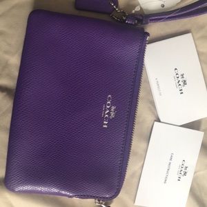 Small coach wristlet. Tags attached never used